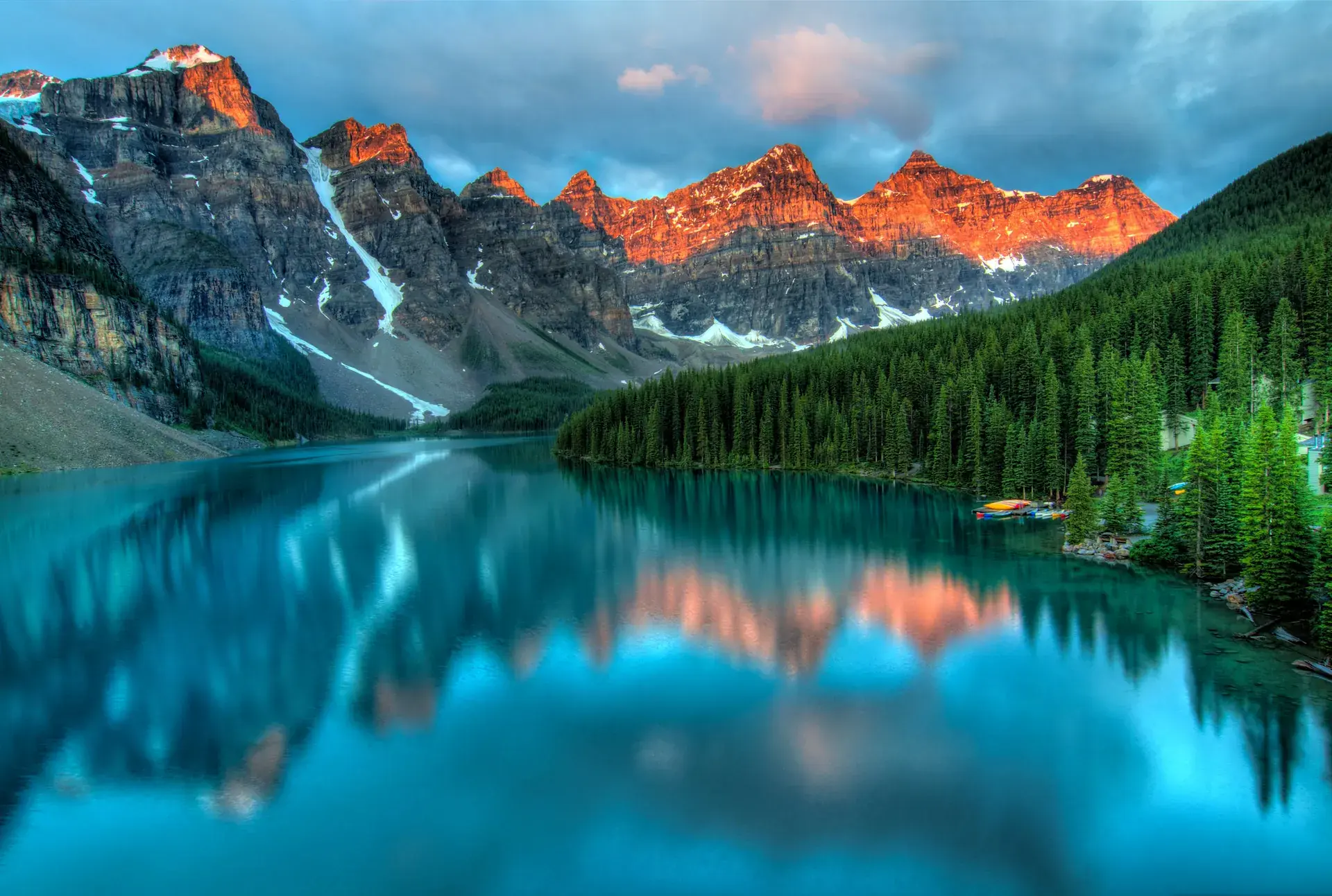 Mountain lake and peaks at sunrise in Banff